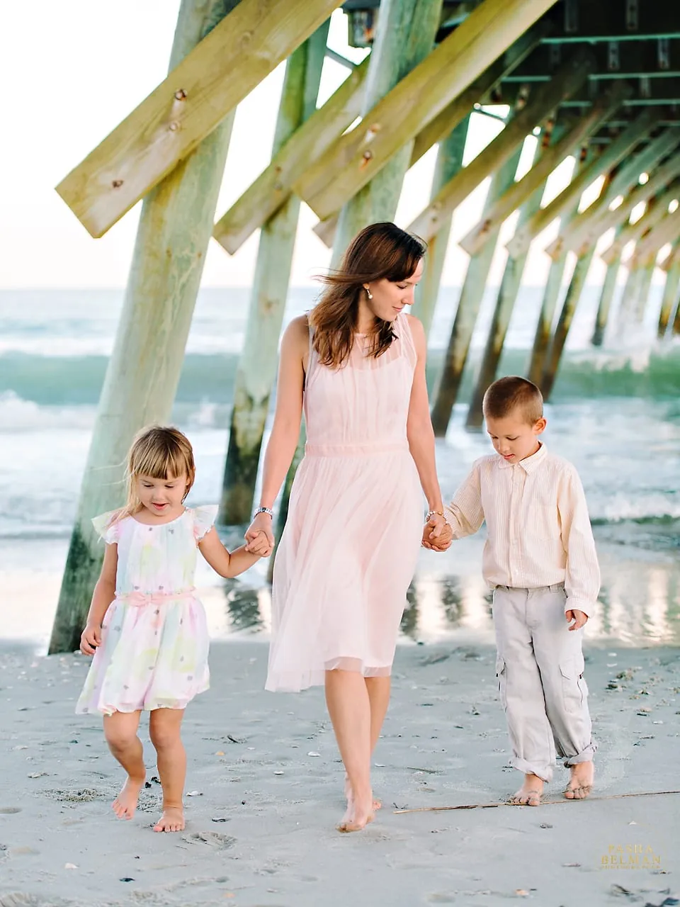 Family beach portraits near Surfside Beach SC photographed by Pasha Belman Photography