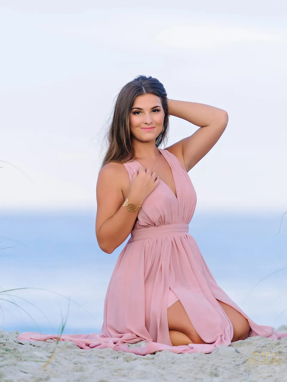 Myrtle Beach senior session featuring Mackenzie on the beach with natural light and elegant high school senior portraits