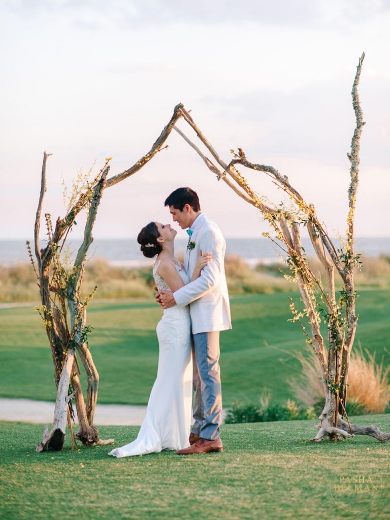 Stunning oceanfront wedding ceremony at Ocean Course Charleston, a coveted wedding venue in South Carolina. 
