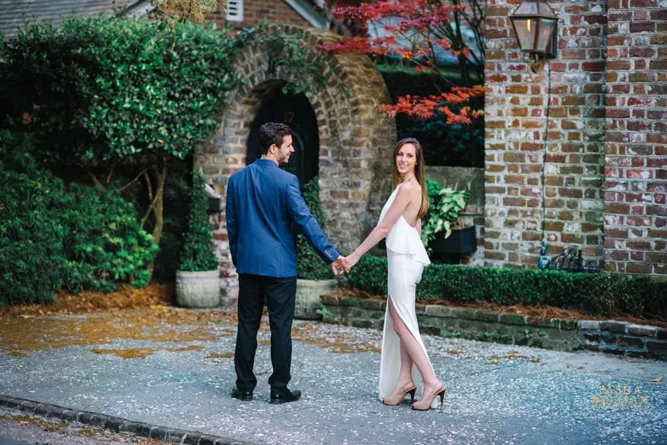 Charleston engagement photography with timeless downtown backdrop