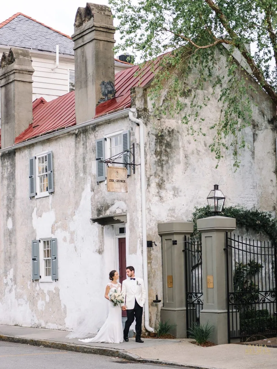 Couple portrait in the Gadsden House courtyard at golden hour