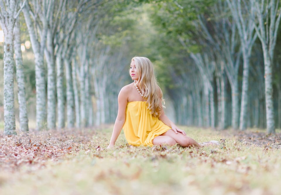 High School Senior Girl wearing Short Yellow Dress to Photography Session in Charleston, SC