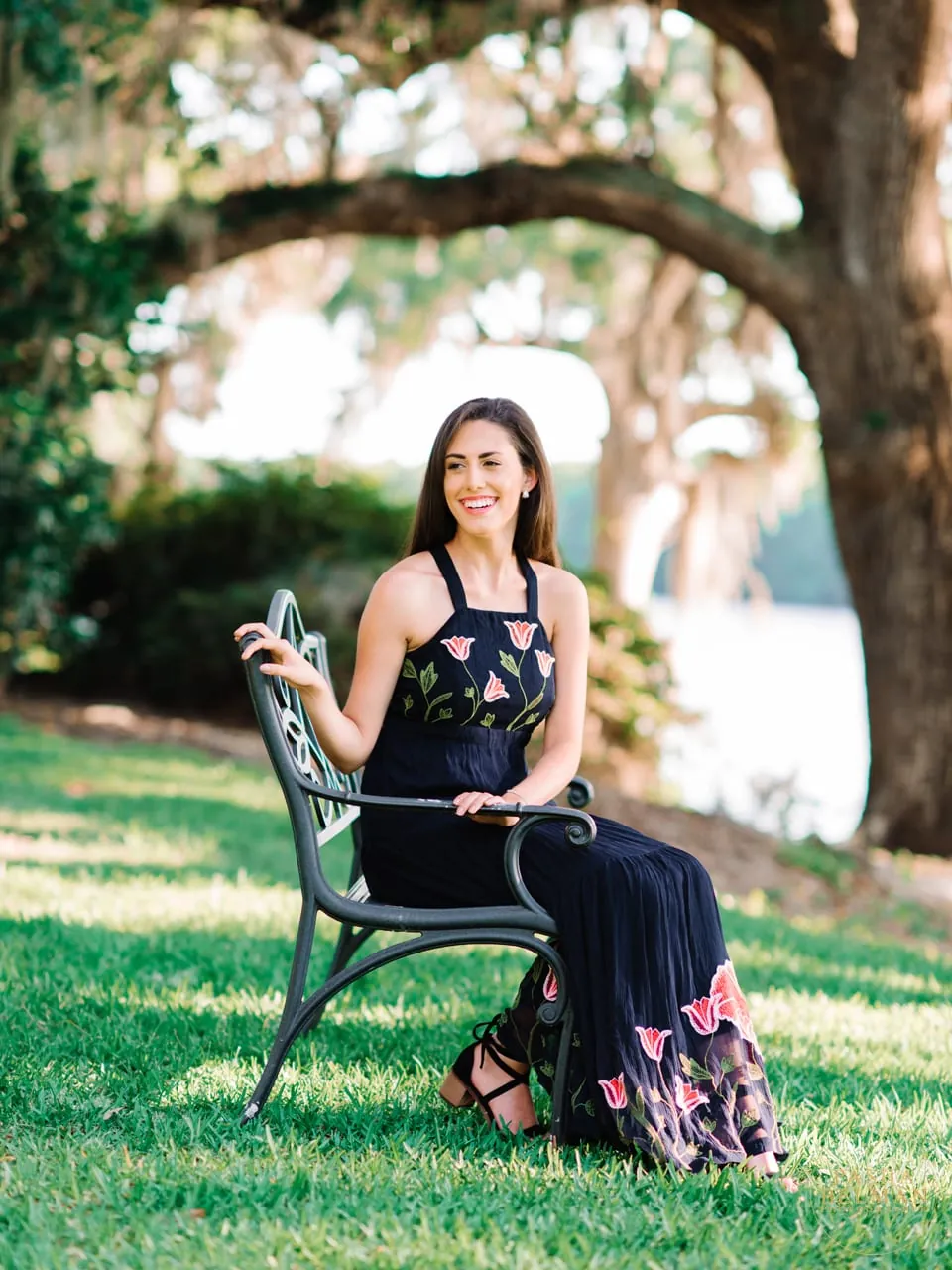 Confident high school senior portrait with ocean backdrop in Myrtle Beach