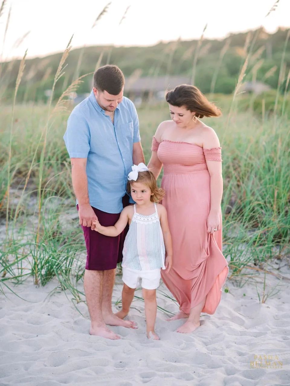 Family portrait as the evening light turns warm over the dunes