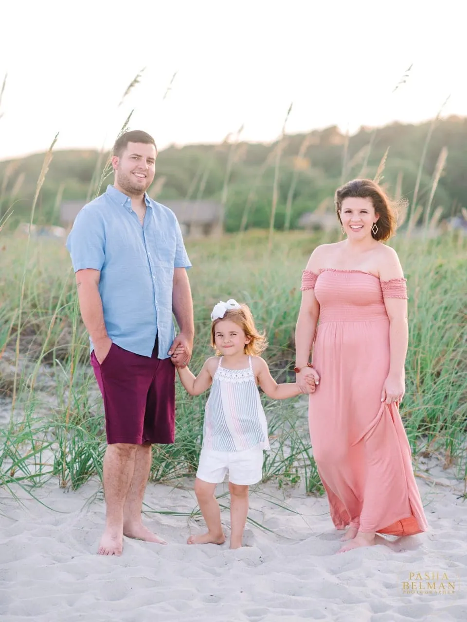 Family portrait as the sun begins to set over the dunes