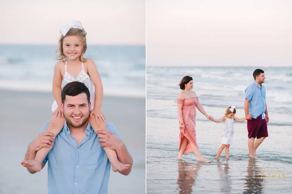 Family standing together at the water's edge