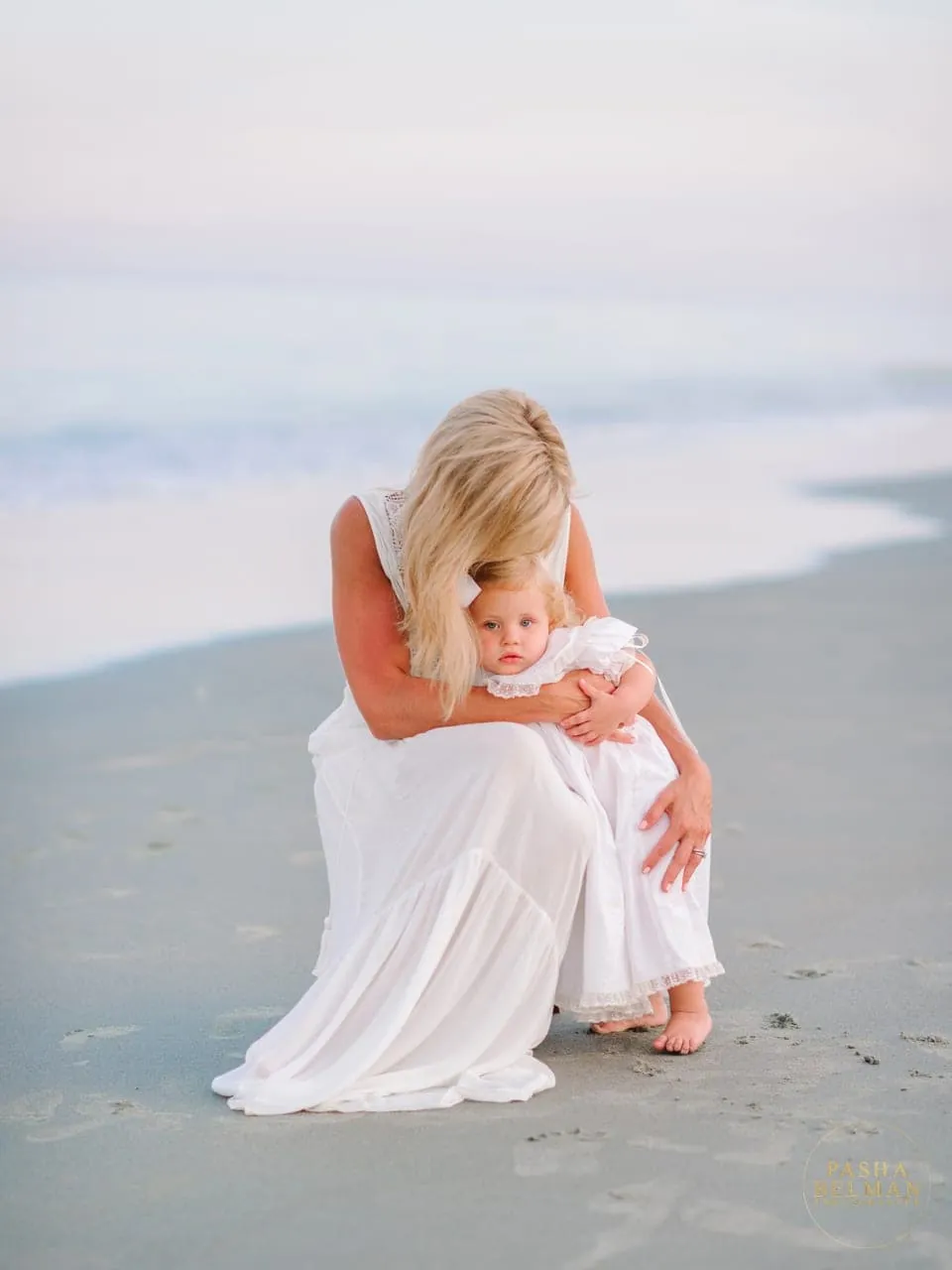 Candid portrait of Ainsley Earhardt and her daughter on the beach