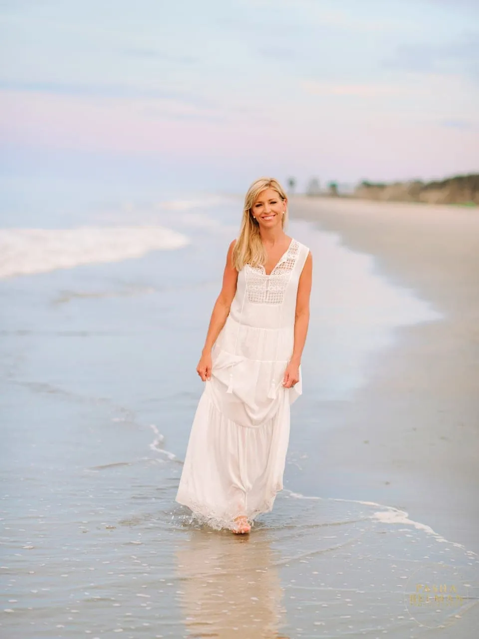 Natural light portrait of mother and daughter on the beach at Debordieu Colony