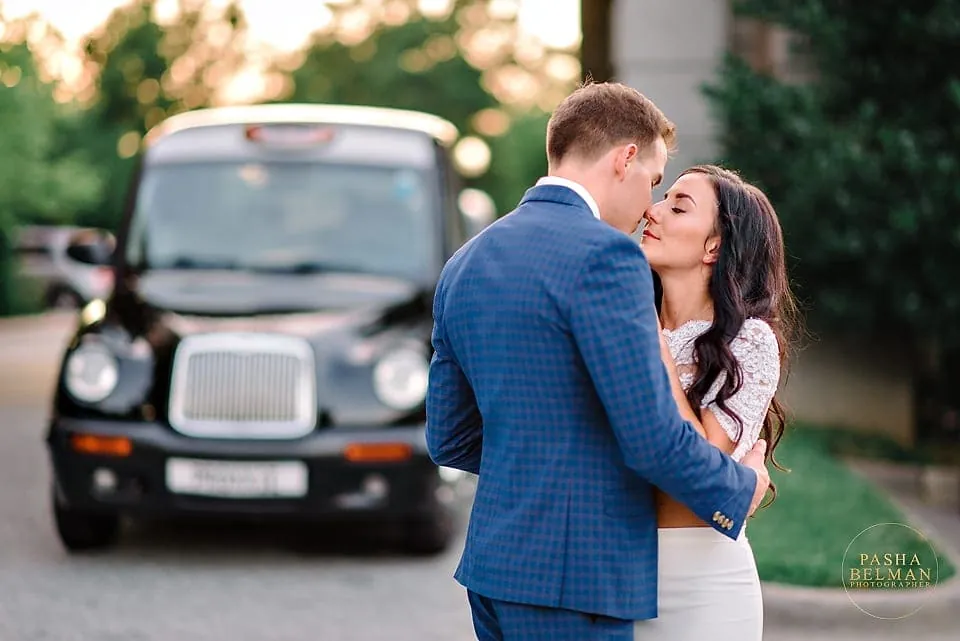Greensboro Wedding Photography at O.Henry Hotel by Top Greensboro Wedding Photographers | Bride and Groom Kissing Near O.Henry Hotel | Romantic Wedding Day Photos