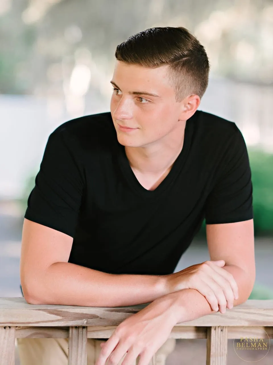 Candid senior guy portrait among greenery near Pawleys Island by Pasha Belman