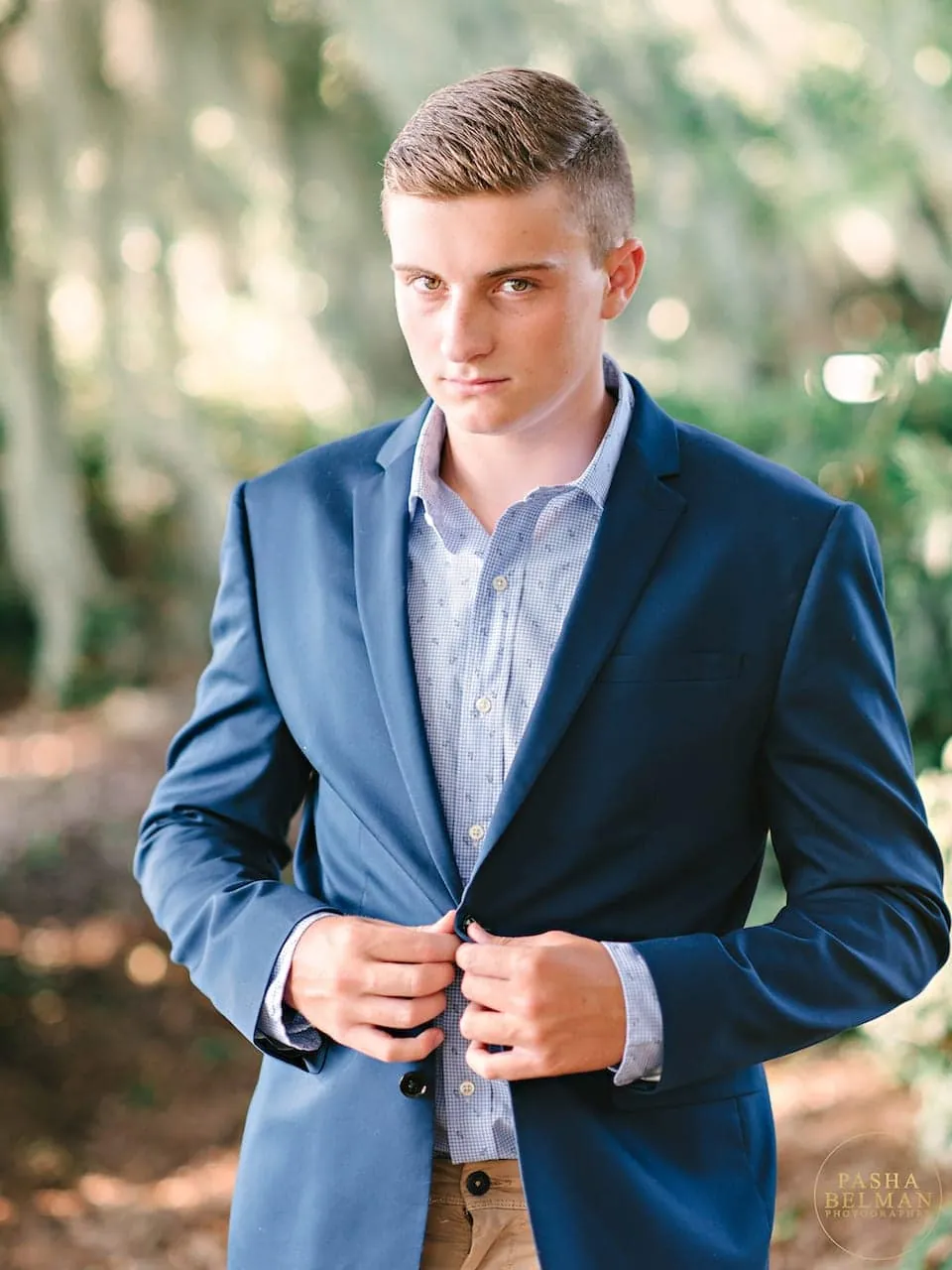 Senior guy candid portrait in a greenery corridor near Myrtle Beach