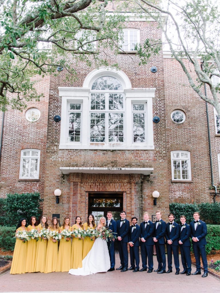 Romantic wedding ceremony at the Historic Rice Mill, captured by a top wedding photographer in Charleston. 