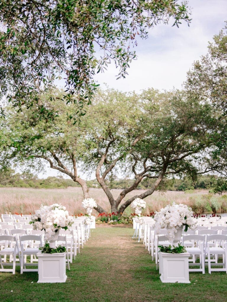 Beautiful Wedding Ceremony Setup with chairs and flowers