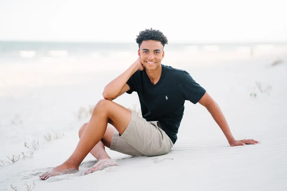 Myrtle Beach senior guy portrait with casual outfit and confident natural pose photographed by Pasha Belman Photography