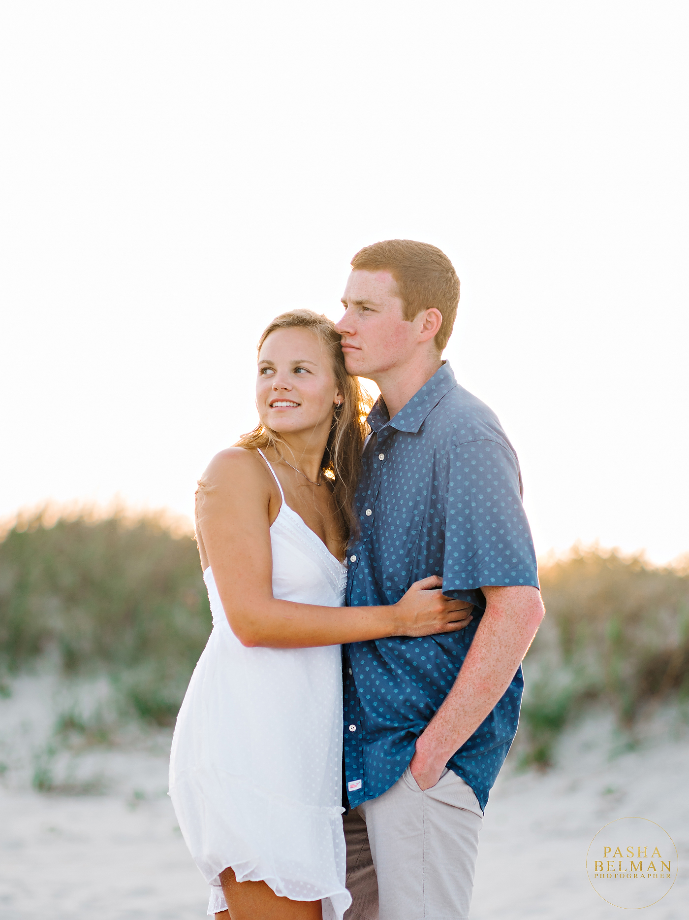 Adorable Couple Engagmenet Photos in White and Blue Outfits 