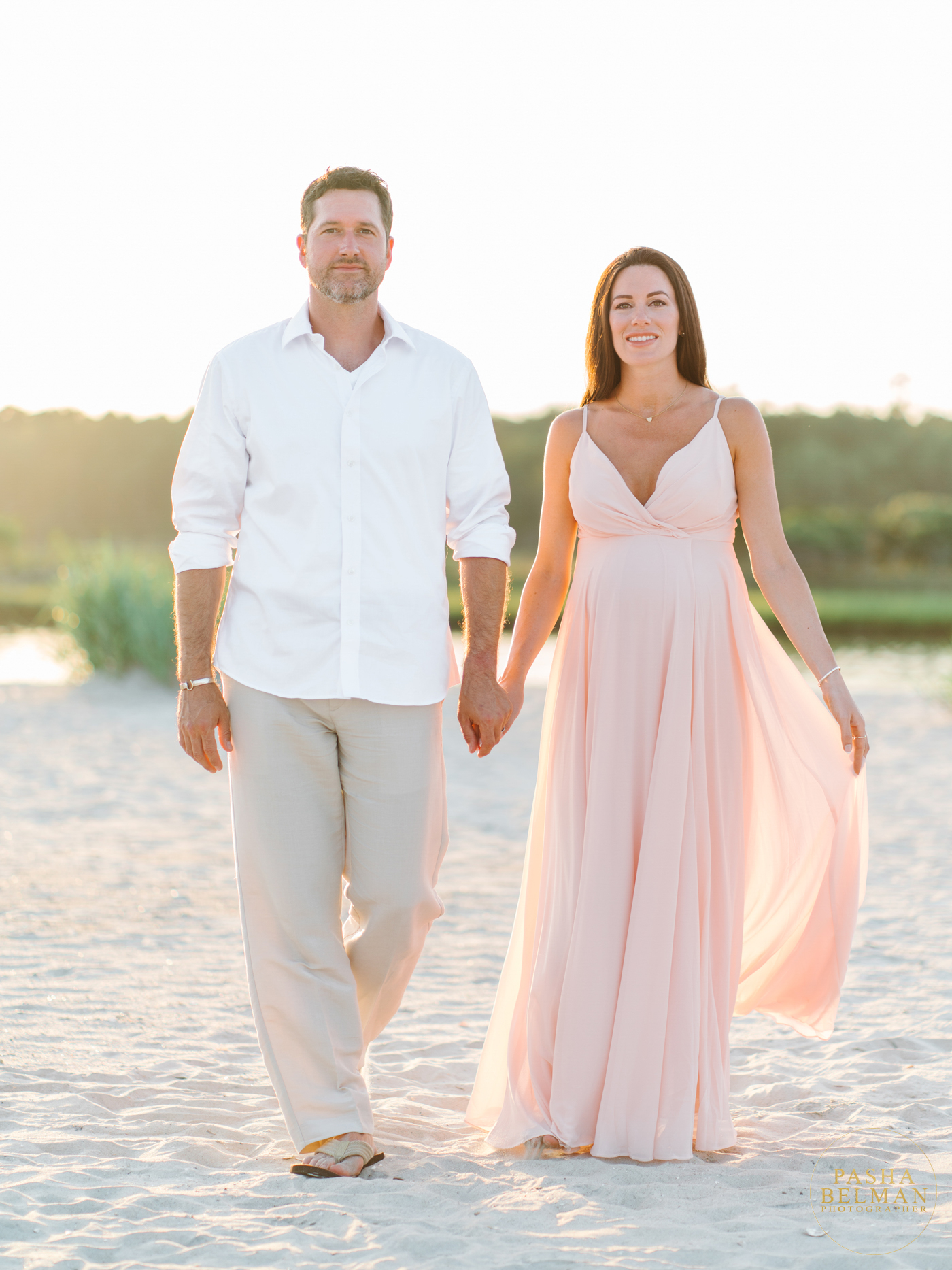 How to pose a couple during maternity session in Pawleys Island?