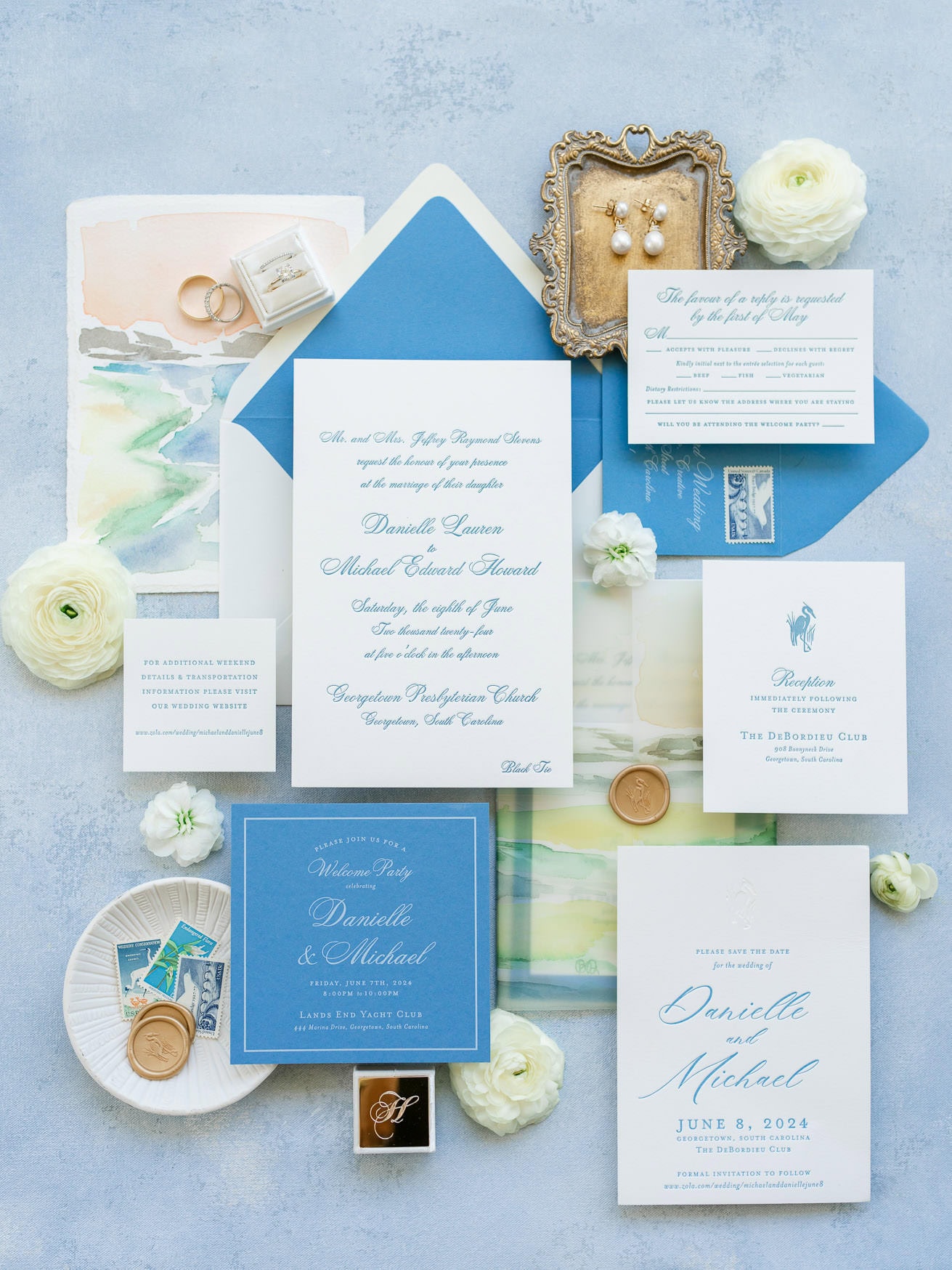 Elegant wedding invitation suite with blue and white accents, featuring floral details and RSVP cards, ideal for wedding photography and bridal portrait sessions.