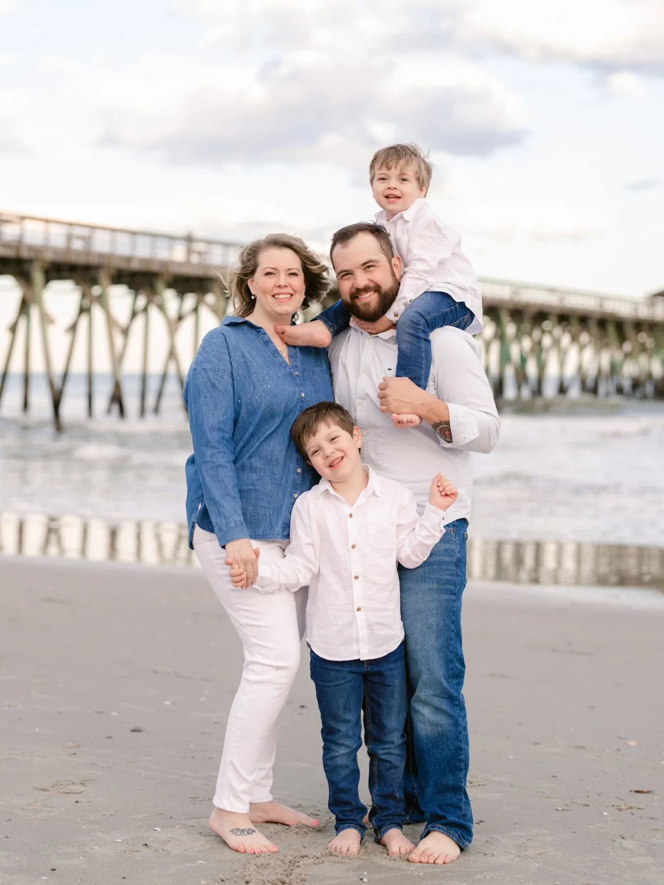 Family beach portrait moment captured in Myrtle Beach