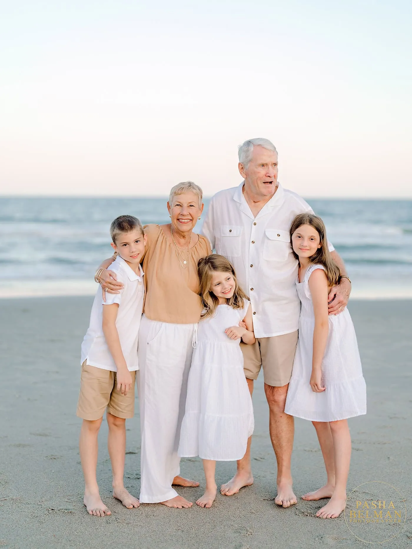 Maher family enjoying a relaxed portrait session along the Myrtle Beach shoreline
