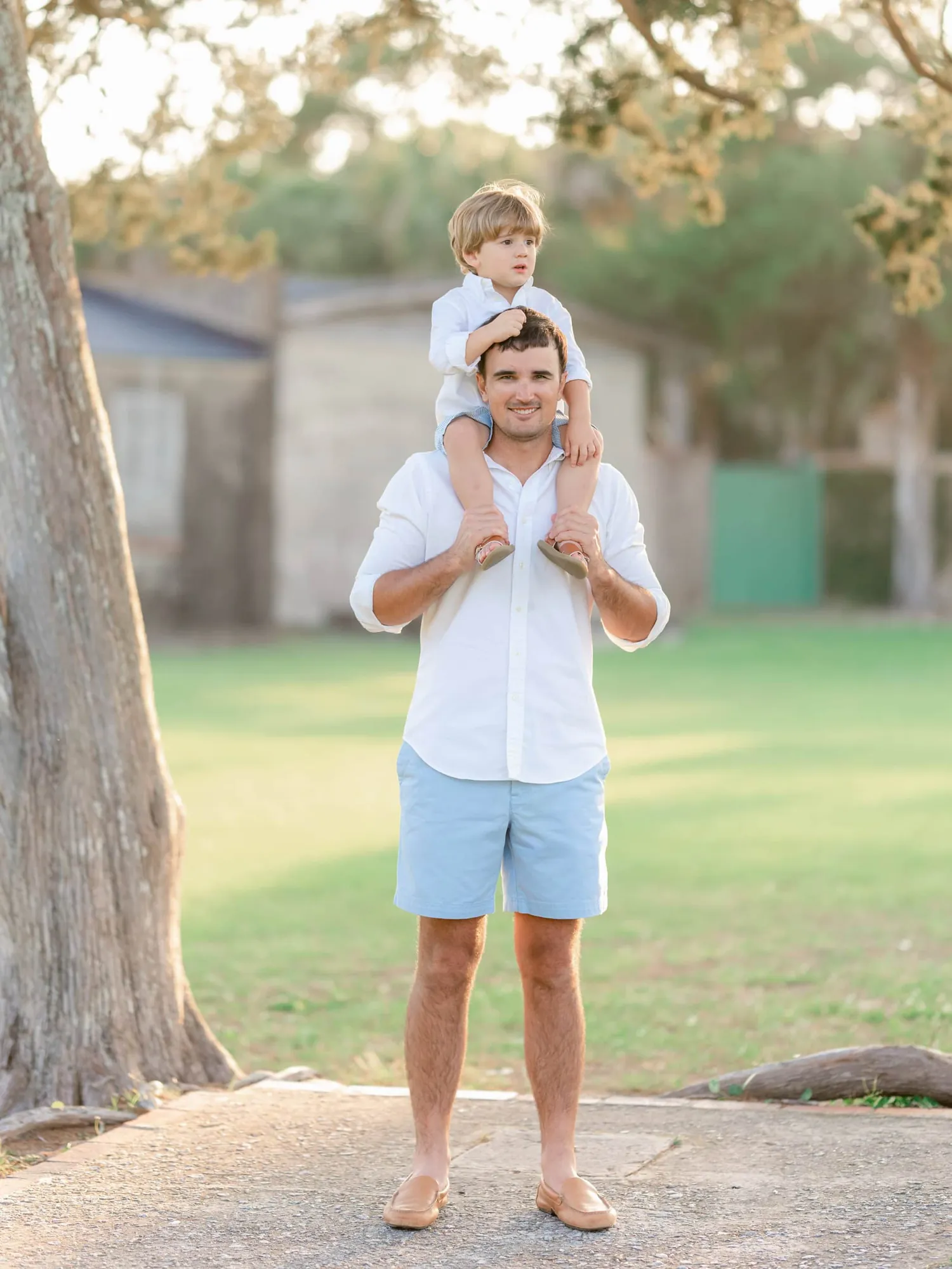 Alexander family portrait with sand and ocean along the Myrtle Beach coast