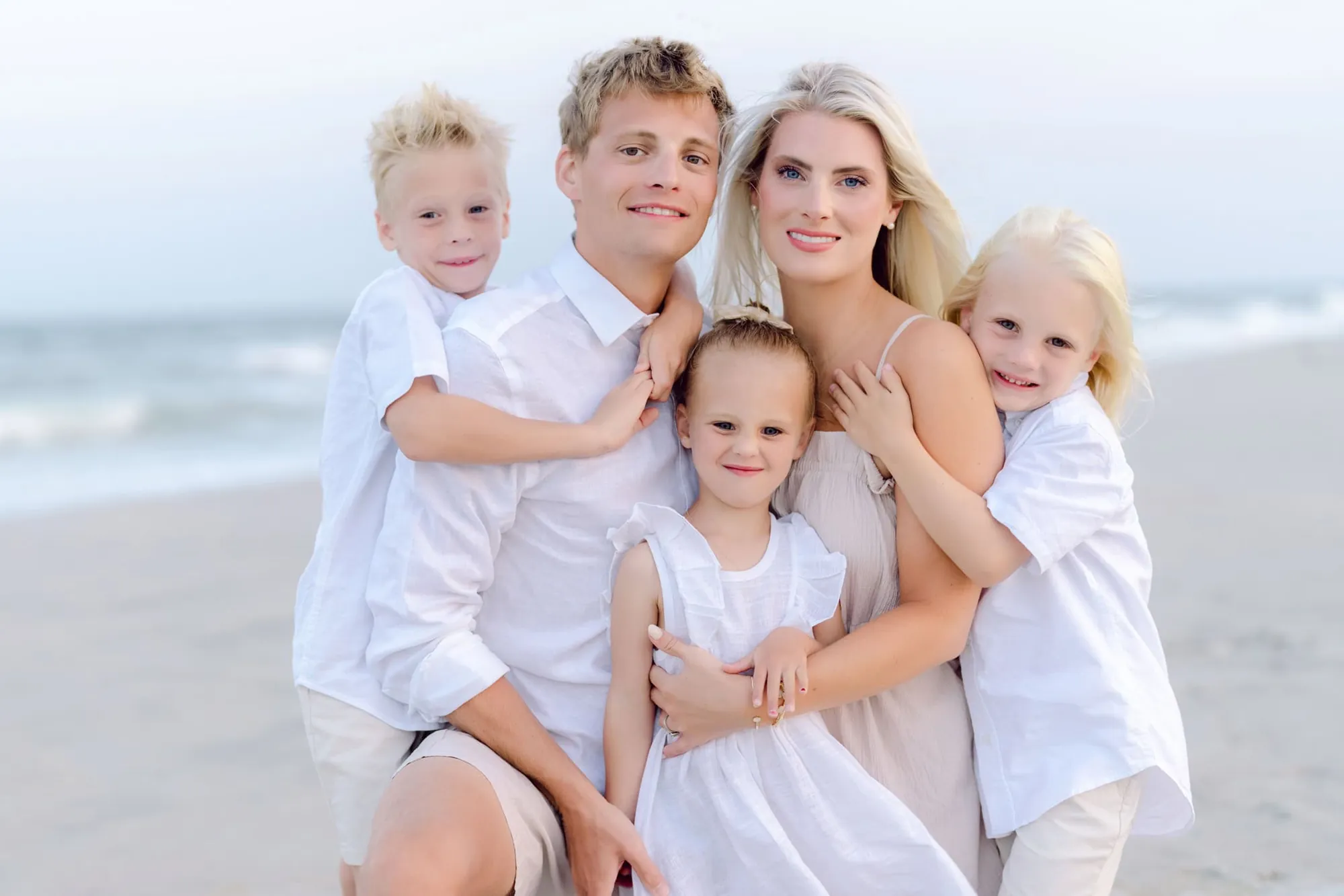 Surfside Beach photographer captures family portraits along the Grand Strand shoreline at golden hour