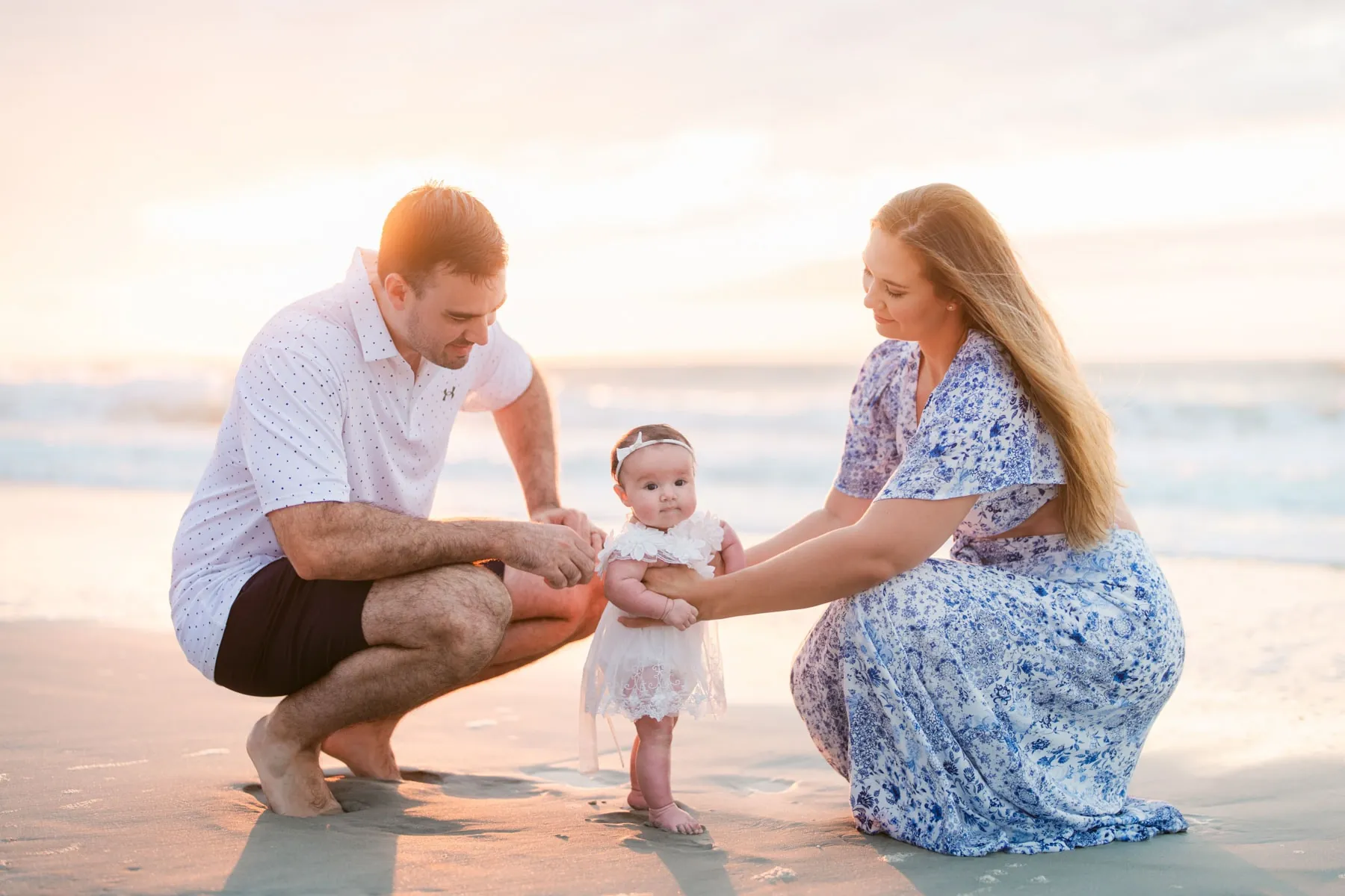 Family beach photography at sunrise with natural light