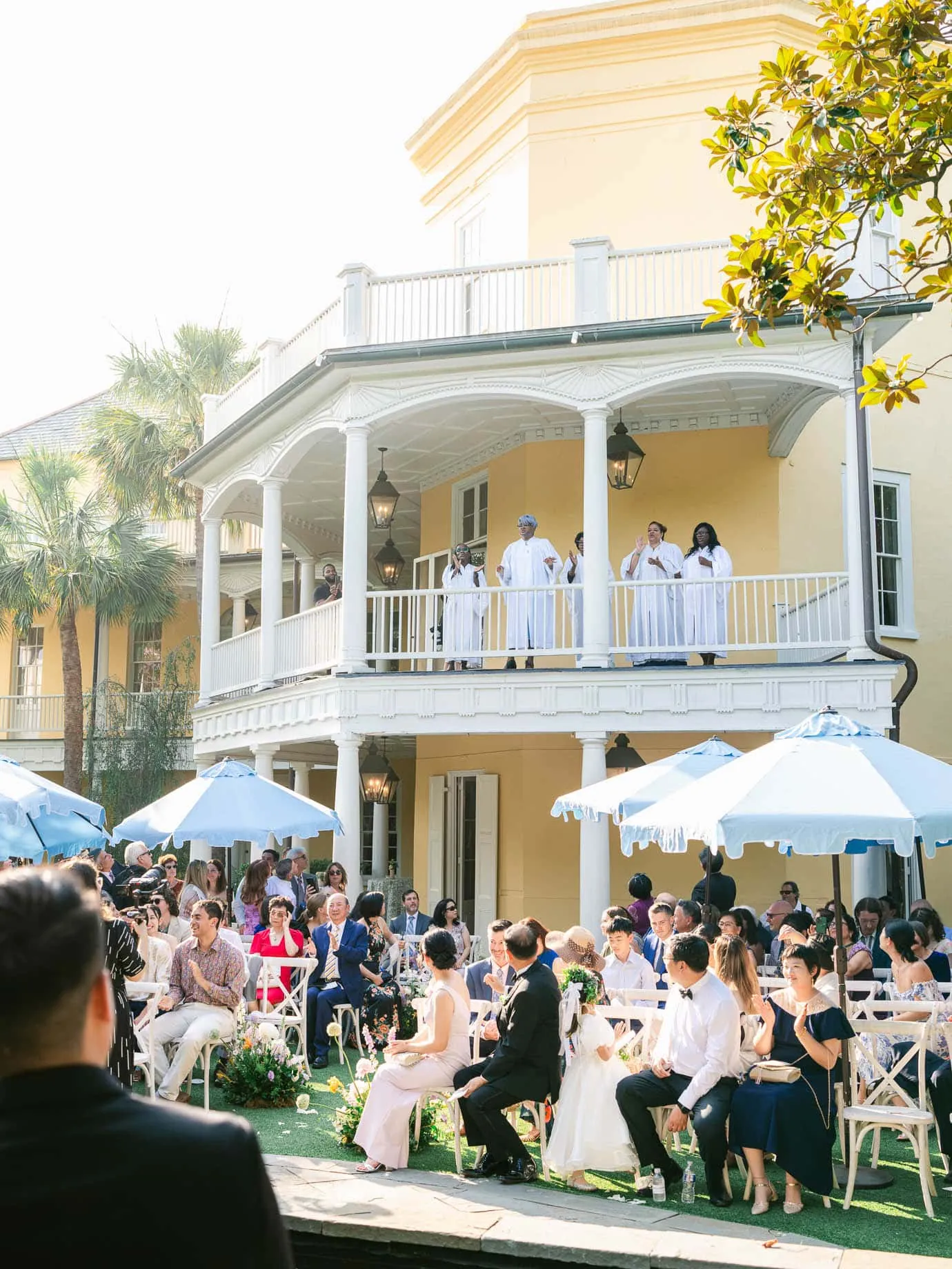 Ceremony beside the reflection pool at the William Aiken House