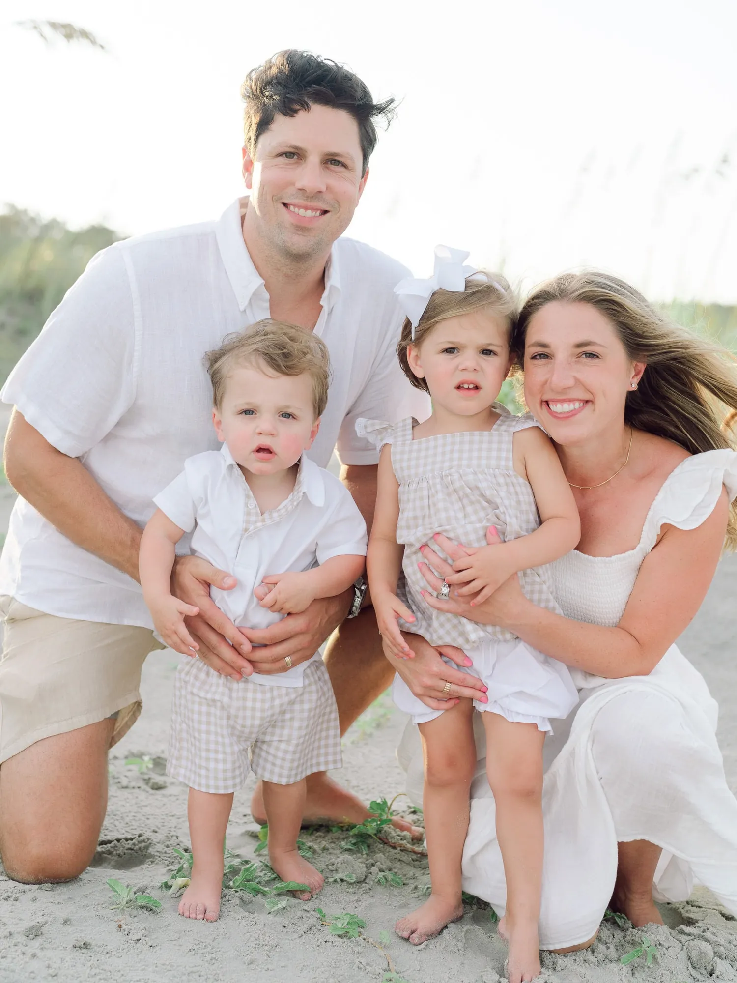 Family of five on the beach in Myrtle Beach SC during a professional portrait session