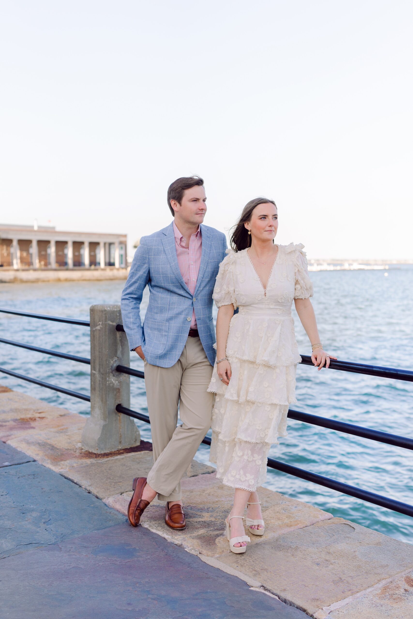 Romantic Charleston SC engagement session at The Battery with stylish couple overlooking the harbor