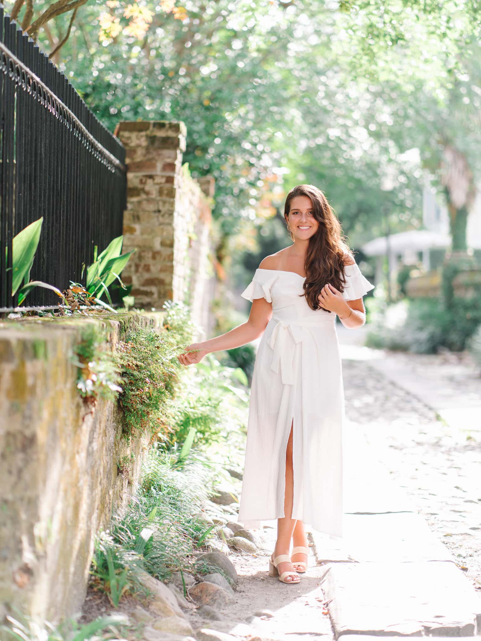Senior girl posing in Charleston for classic portrait photography