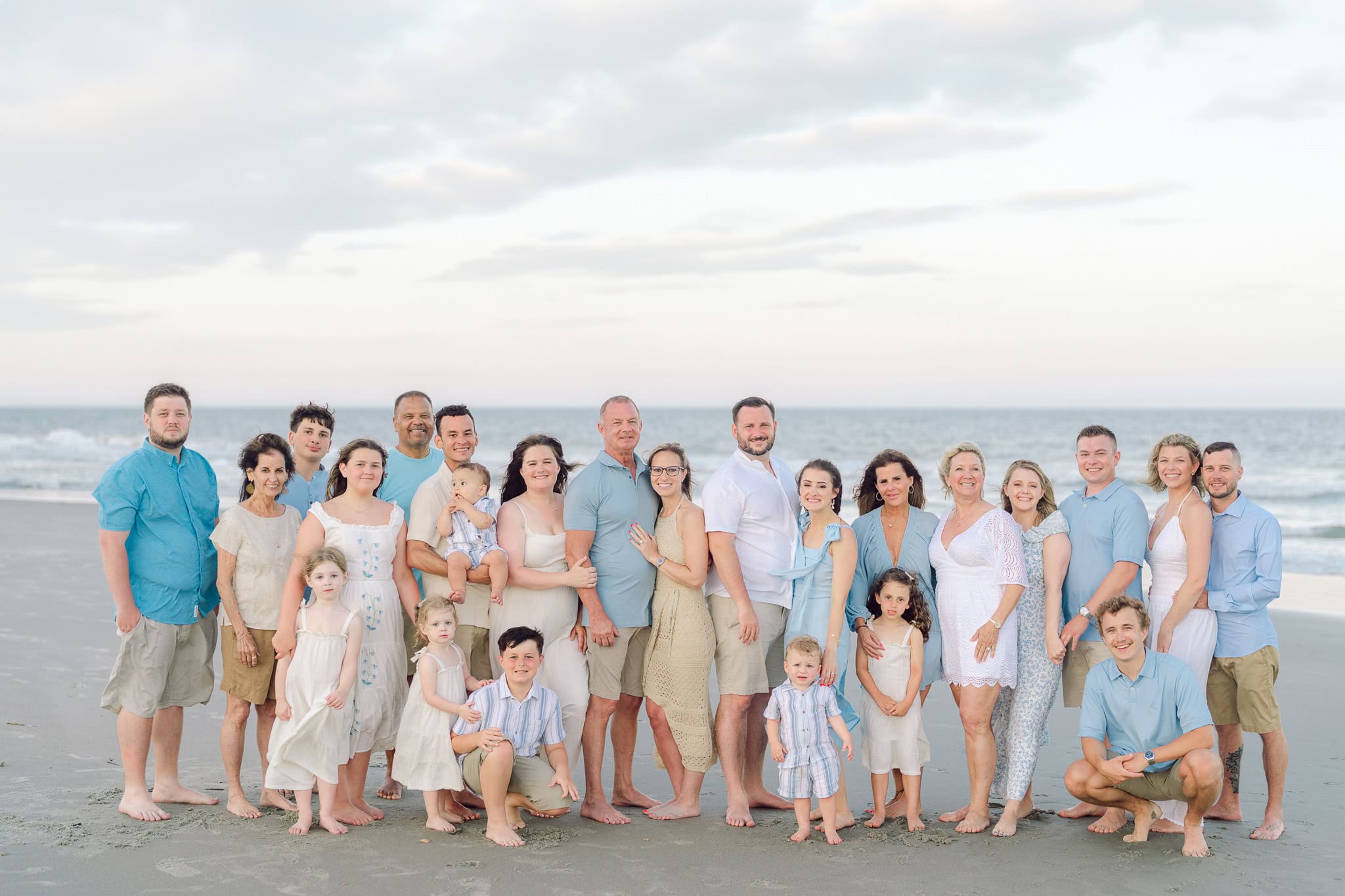 Relaxed family beach portraits in Myrtle Beach during golden hour