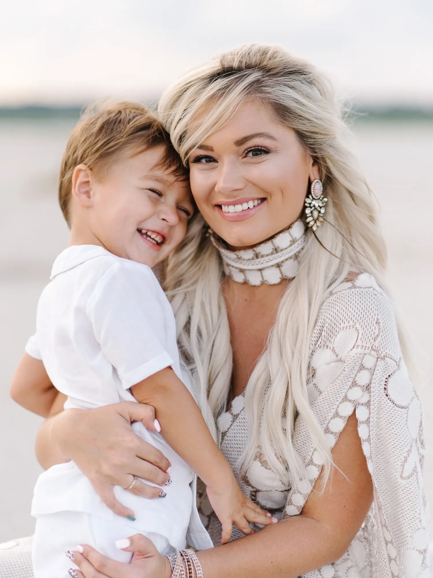 Beautiful family beach portrait at sunrise in Myrtle Beach SC photographed by Pasha Belman