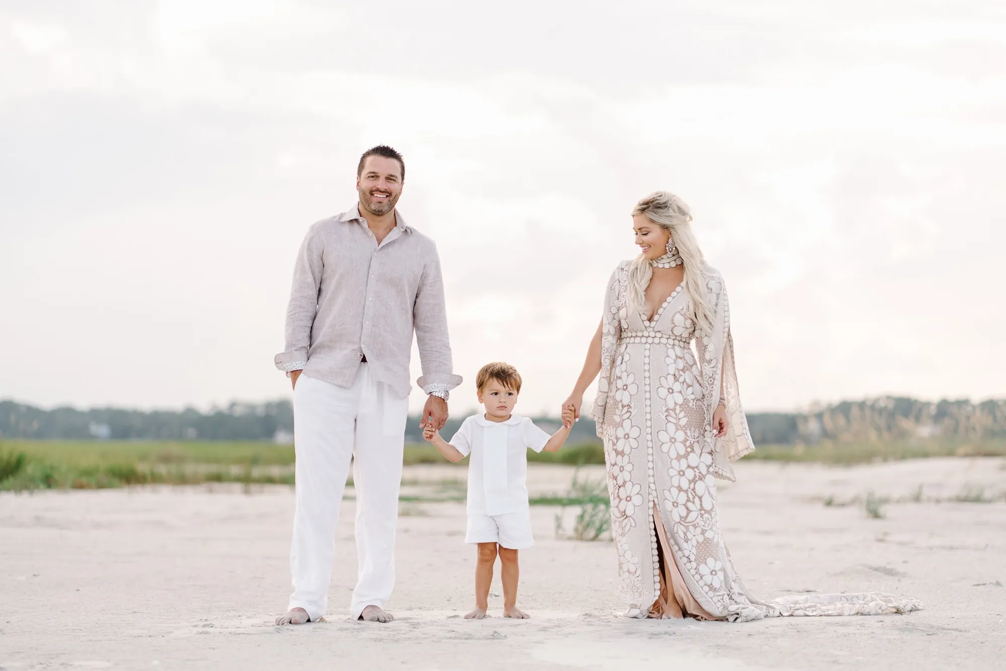 Children playing on the beach during a family photo session in Myrtle Beach SC