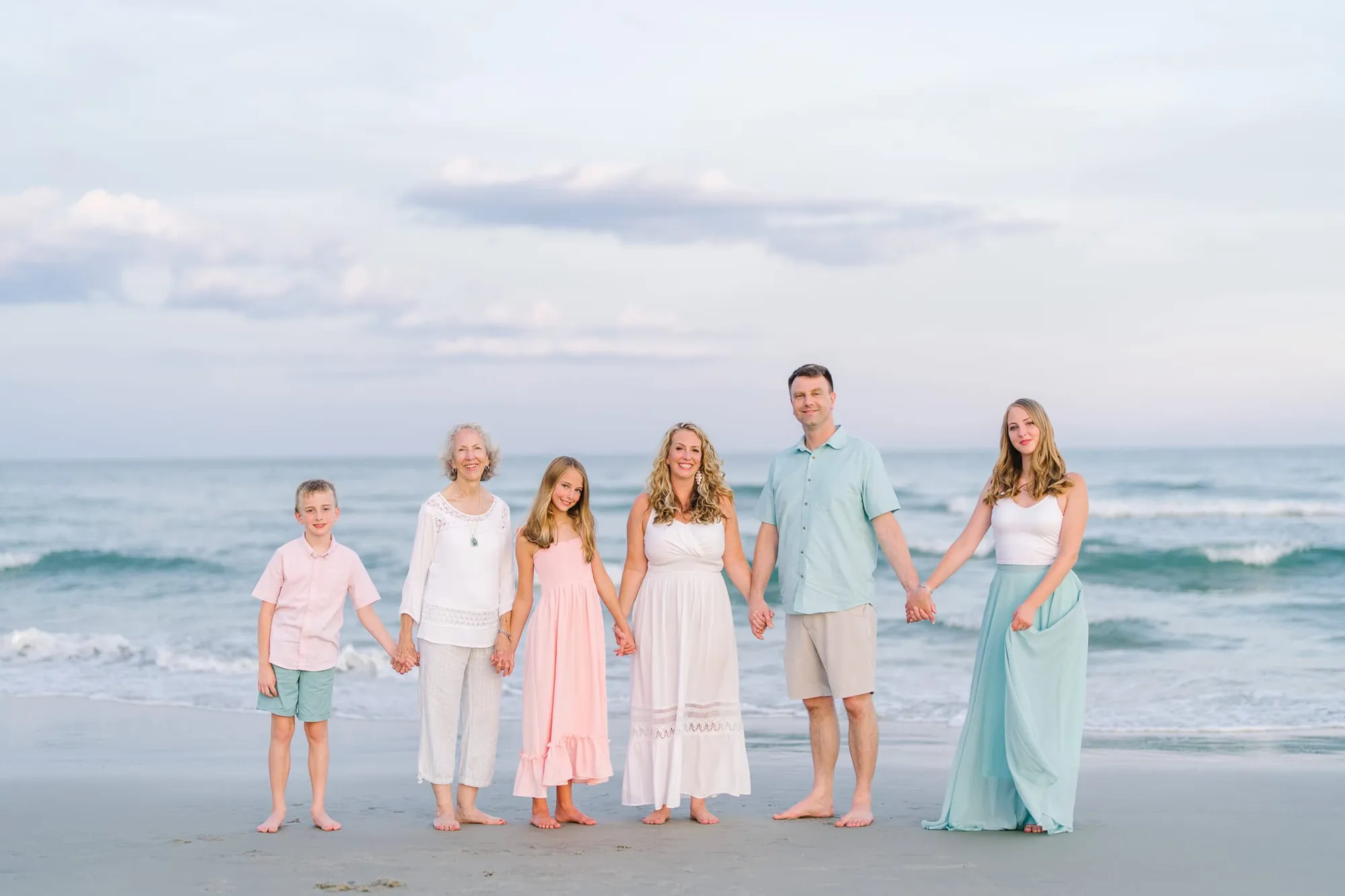 Family beach portrait in Myrtle Beach SC by Pasha Belman Photography