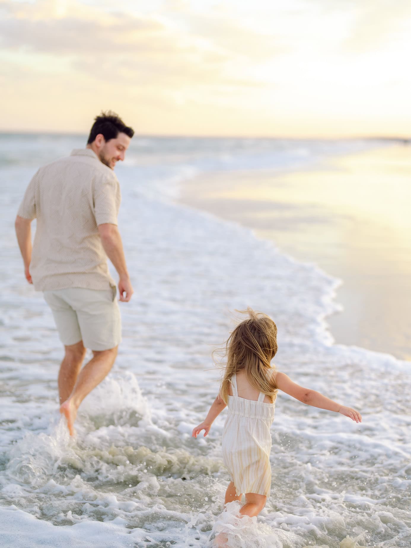 Relaxed family beach portrait session photographed in Cherry Grove South Carolina