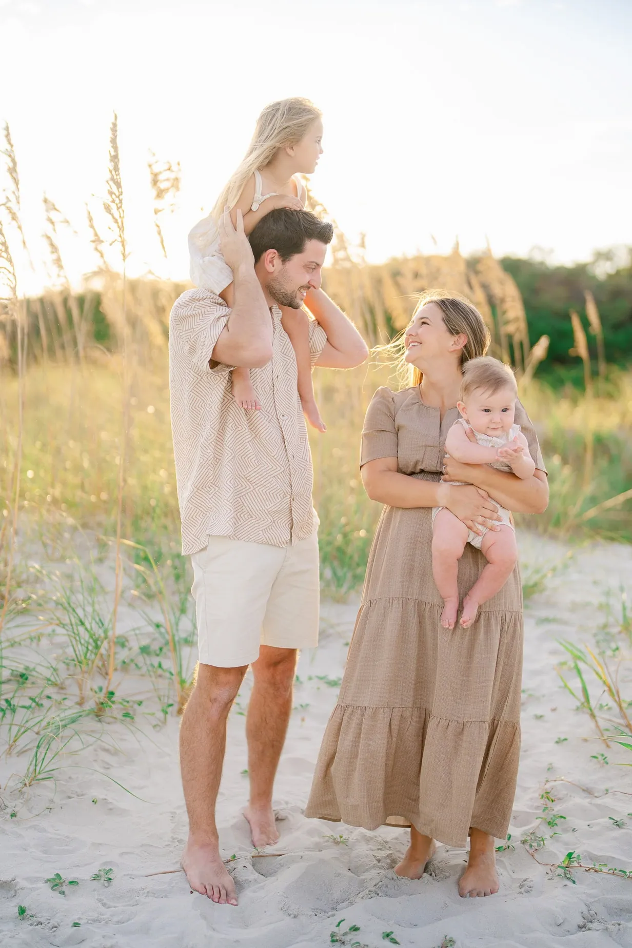 Family portrait photographed on the beach in Little River South Carolina