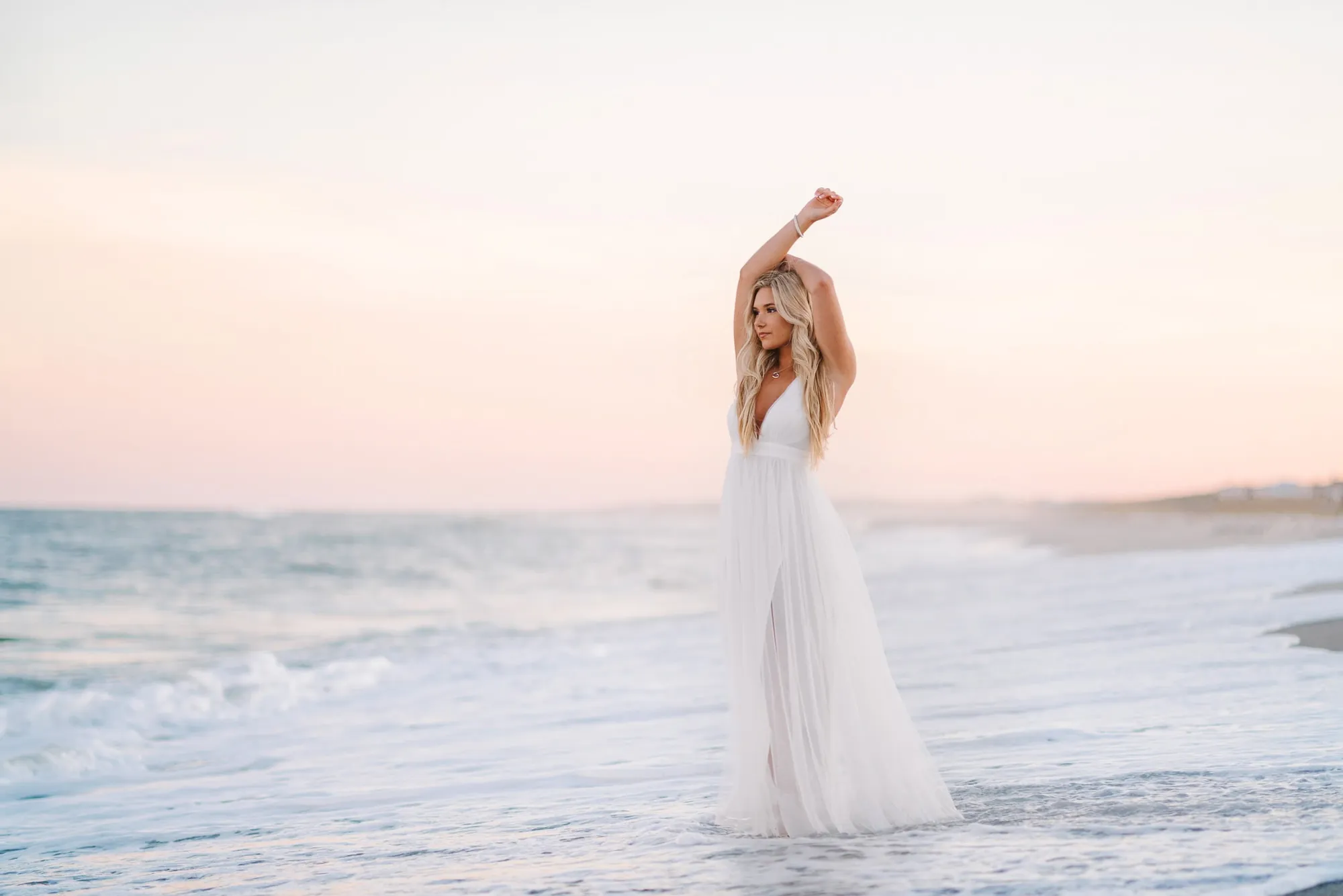 Myrtle Beach senior portrait at sunset with natural coastal light and Grand Strand beach background by Pasha Belman Photography
