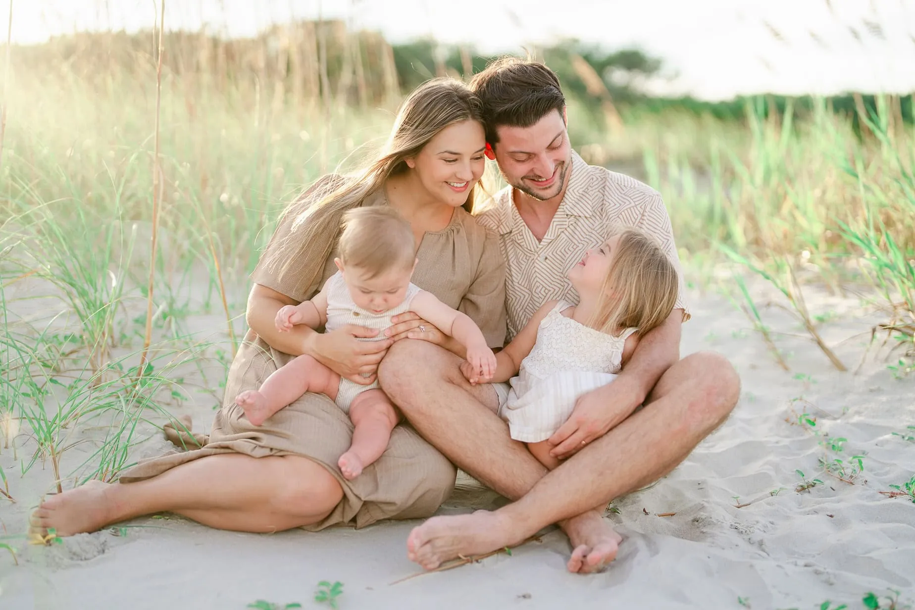Natural family beach photography session in Cherry Grove with soft evening light