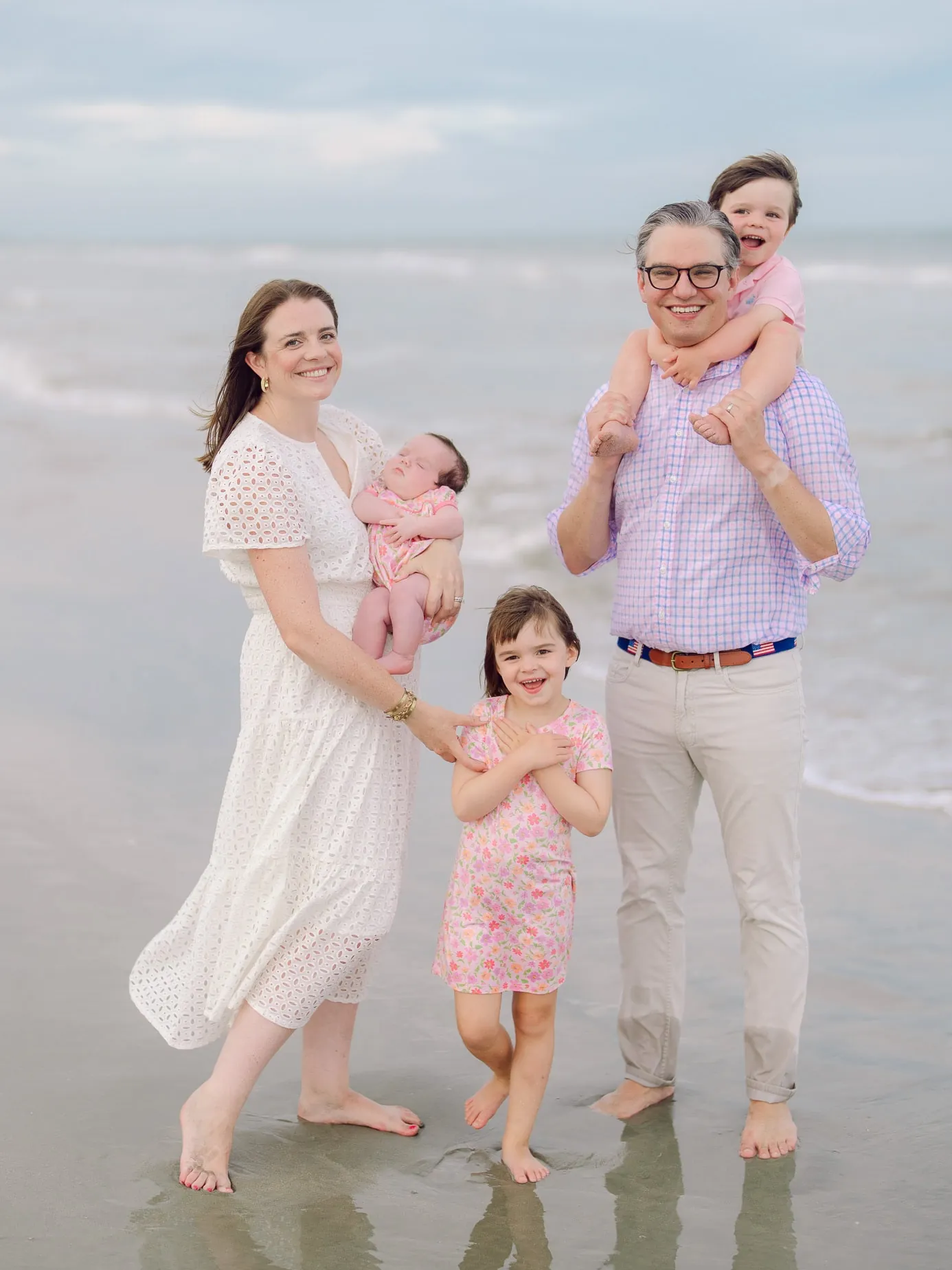 Parents and children enjoying a playful moment together during their Myrtle Beach vacation