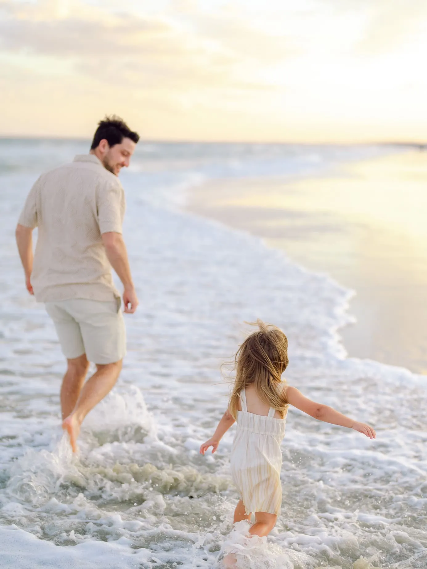 Relaxed family beach portrait session photographed in Cherry Grove South Carolina
