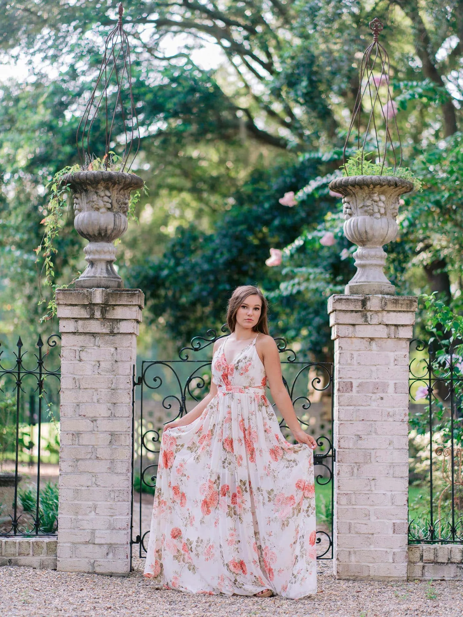 Rustic South Carolina senior portrait photographed in an open field with natural textures and soft light by Pasha Belman