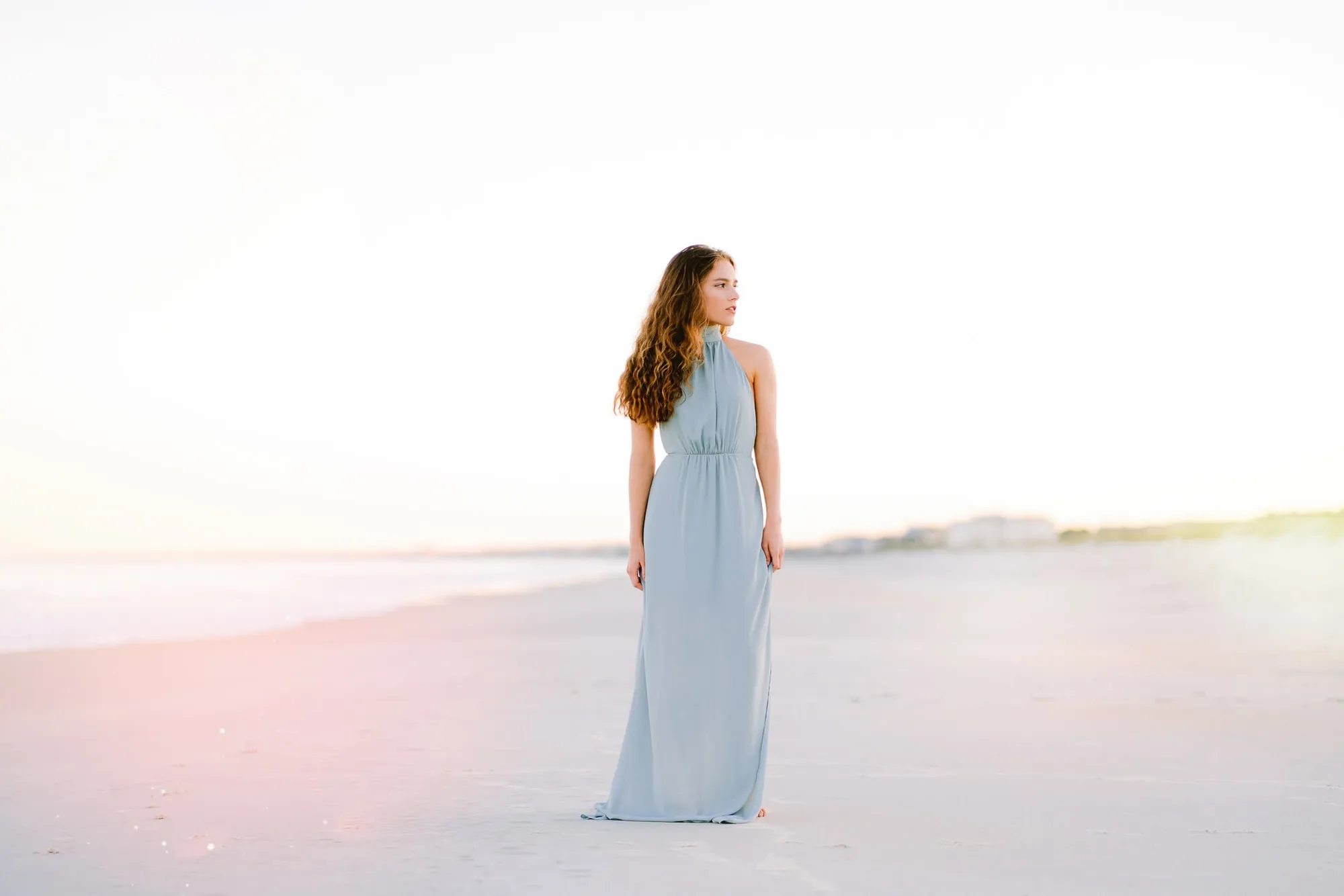 Summer Myrtle Beach senior portrait with warm coastal light and relaxed outdoor beach setting by Pasha Belman Photography