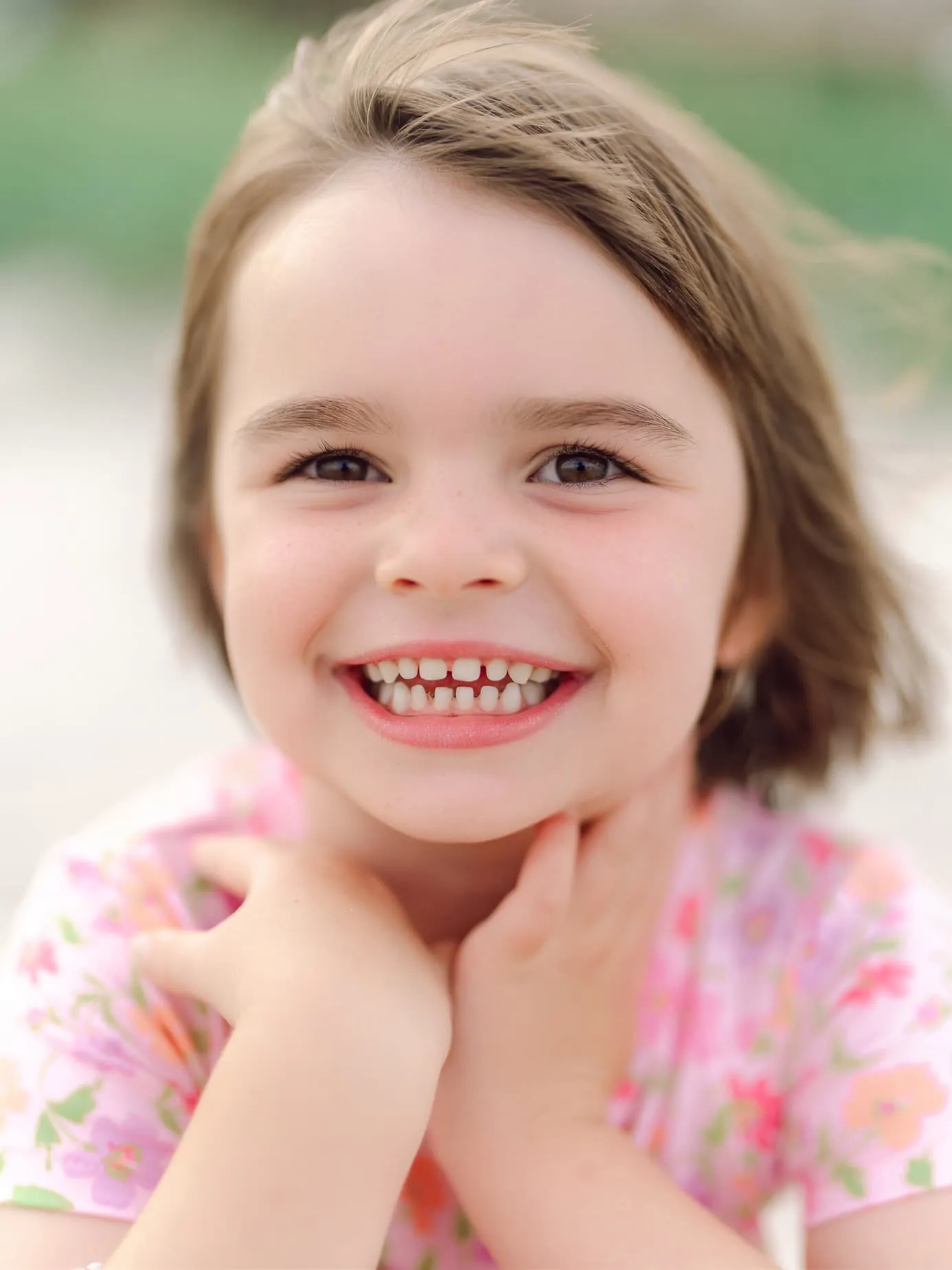 Young girl smiling during her family's annual Myrtle Beach portrait session
