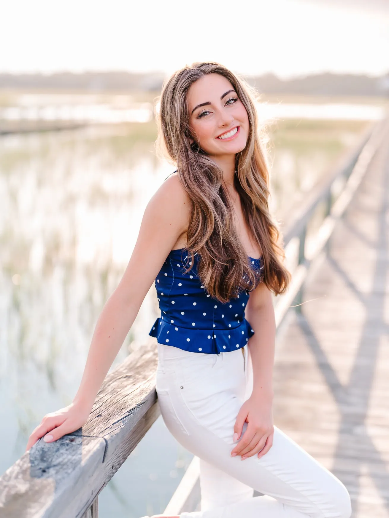Bright and confident Pawleys Island senior portraits captured outdoors with natural light