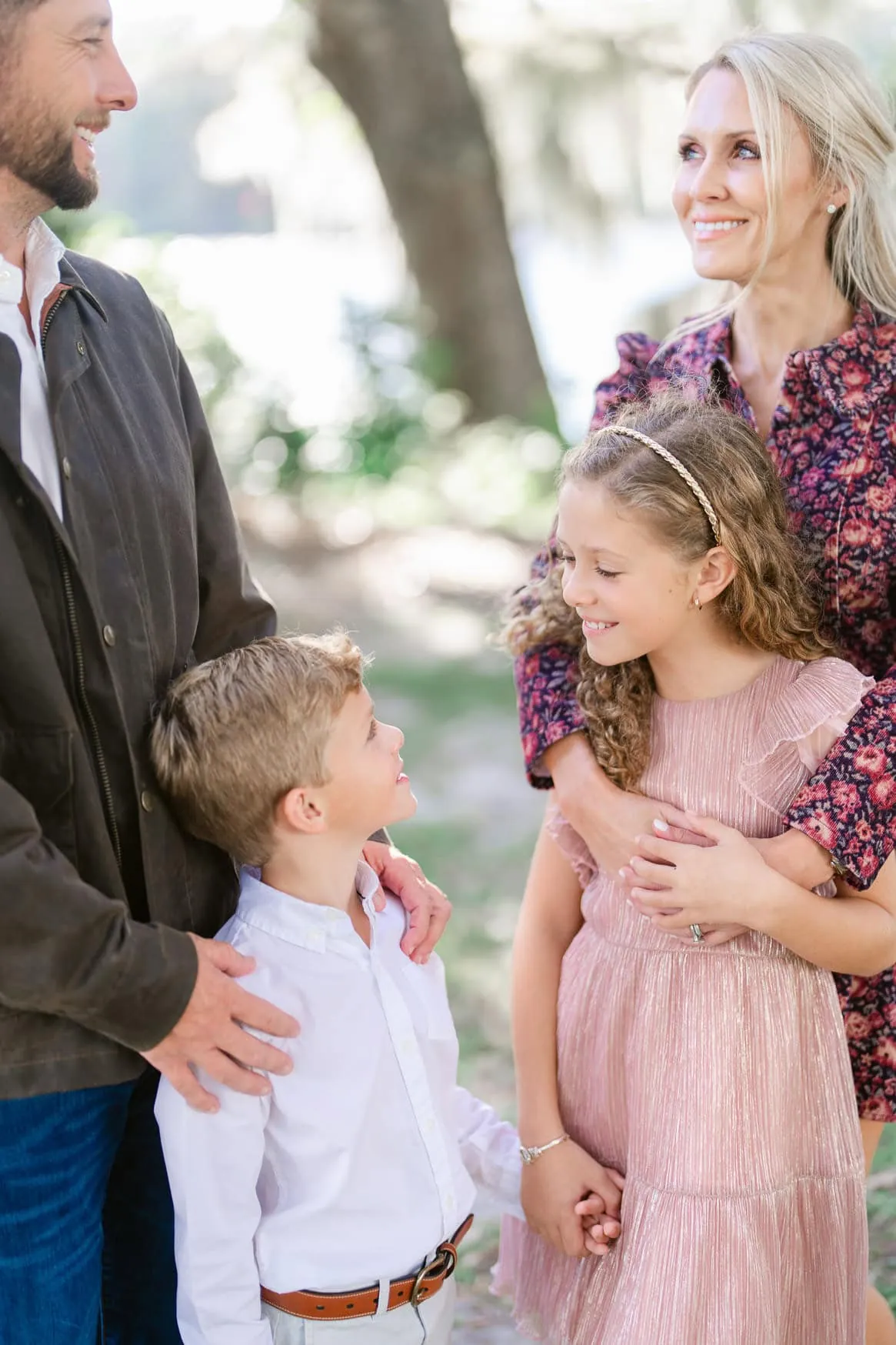 Candid family portrait photographed outdoors at Wachesaw in Murrells Inlet