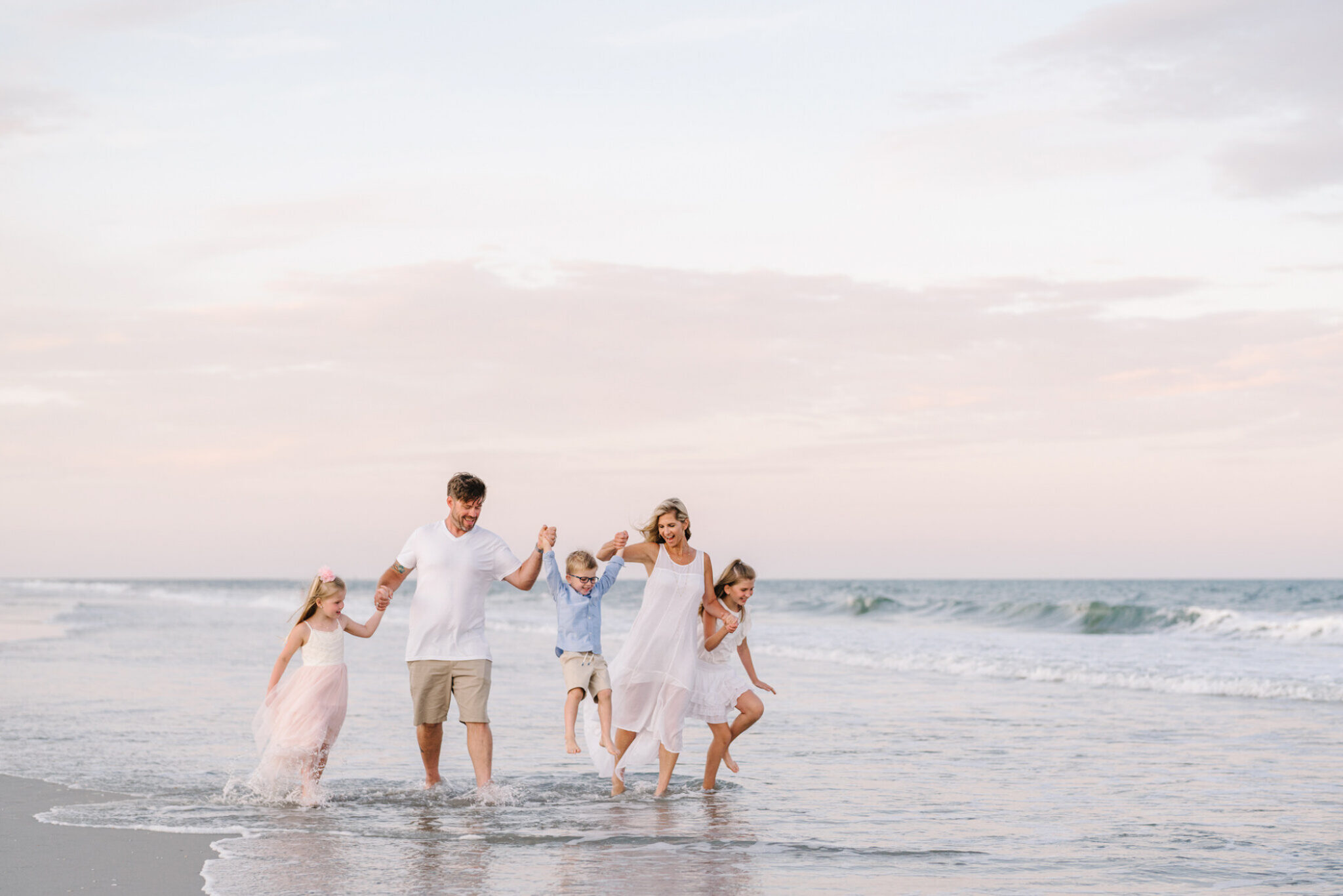 Huntington Beach State Park family photos at sunset by Pasha Belman