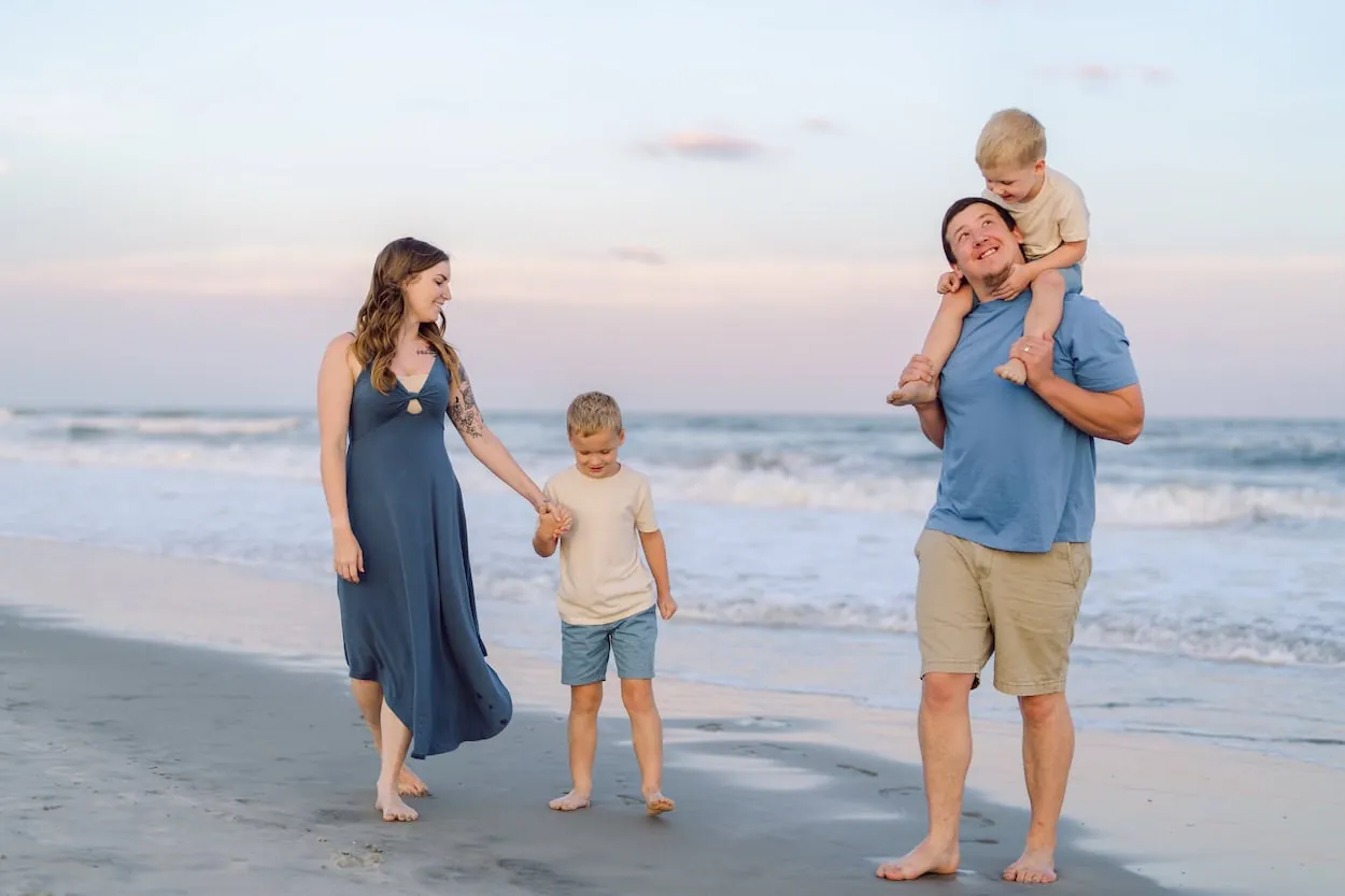 Myrtle Beach family photos on the Grand Strand with wide open beach and Atlantic backdrop
