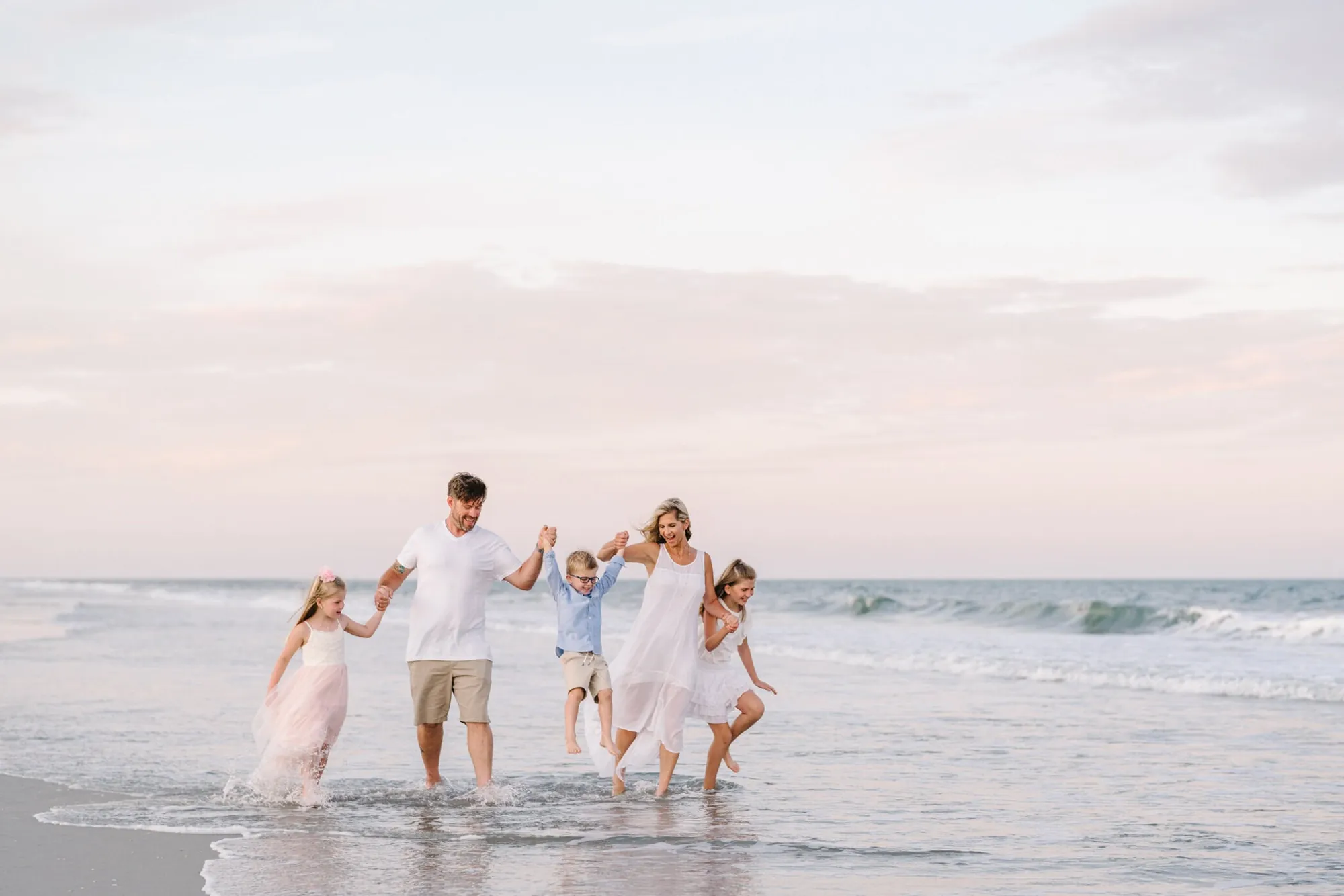 Huntington Beach State Park family photos at sunset by Pasha Belman