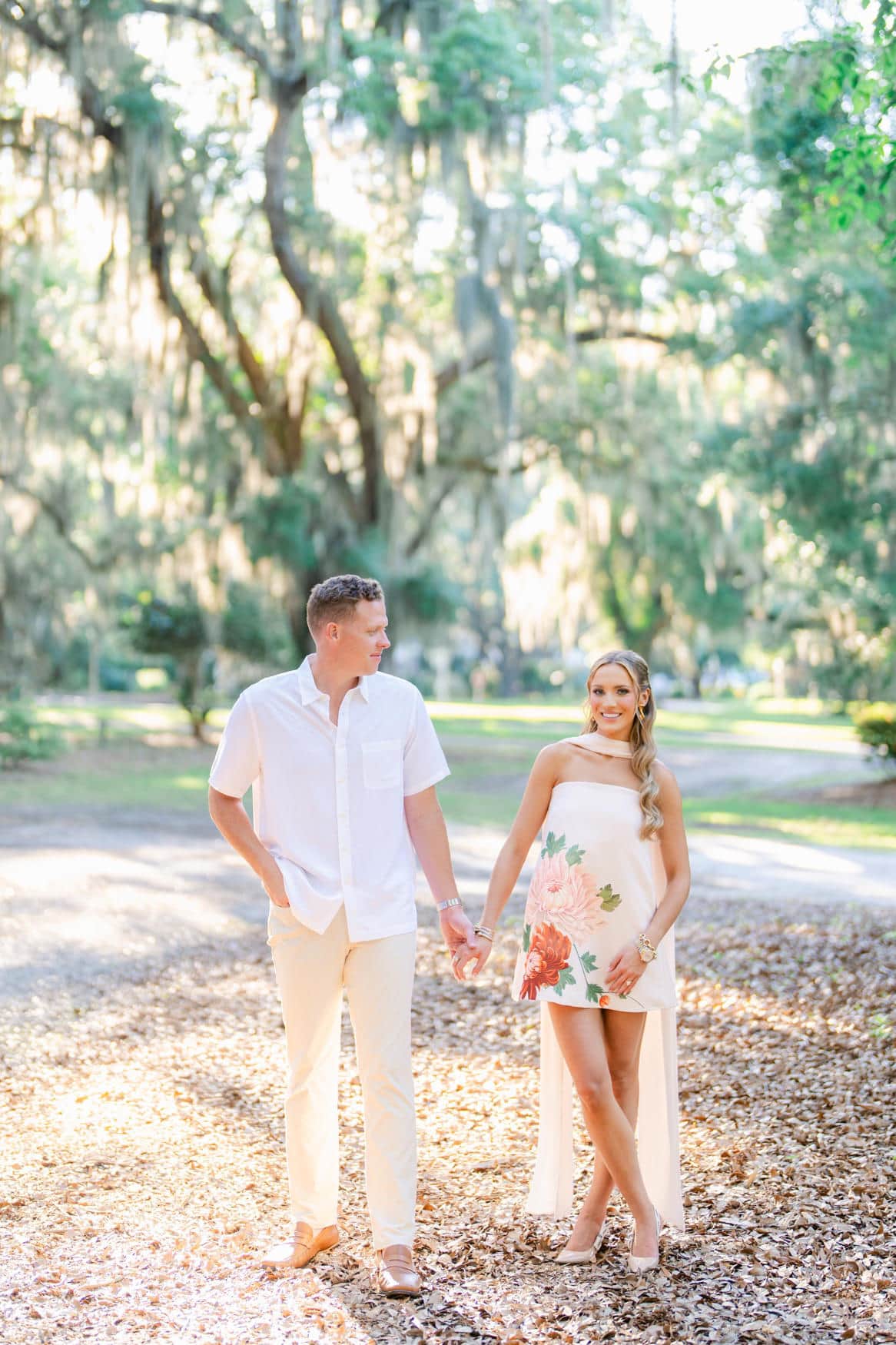 Couple laughing naturally during their Pawleys Island SC engagement session photographed by Pasha Belman