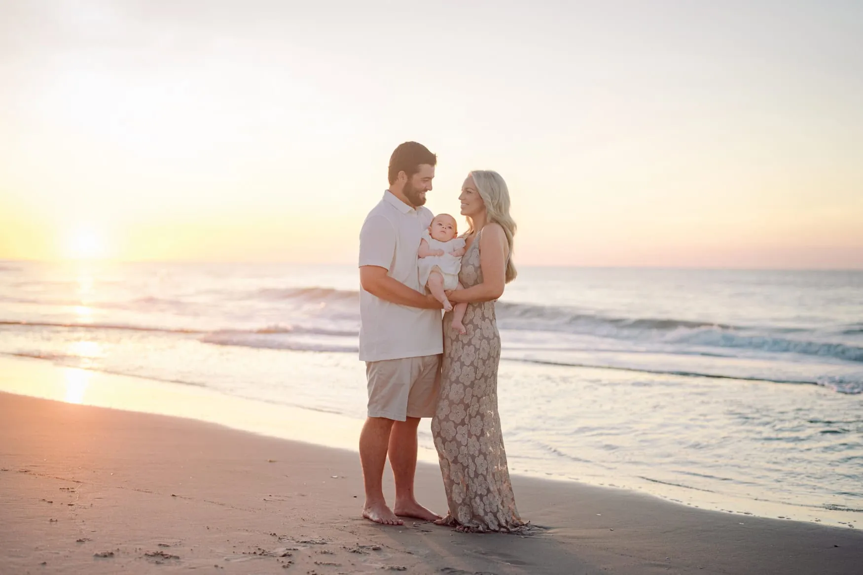 Family enjoying sunrise on Pawleys Island beach
